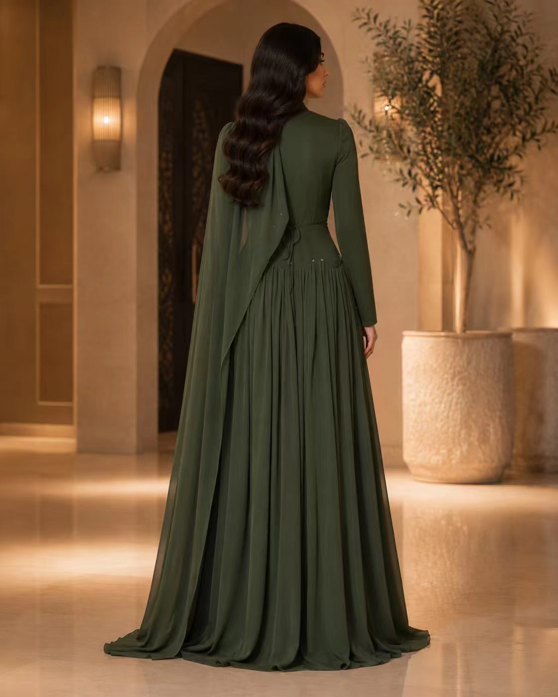 Forest Green Crystal Embellished Gown with Dramatic Shoulder Cape