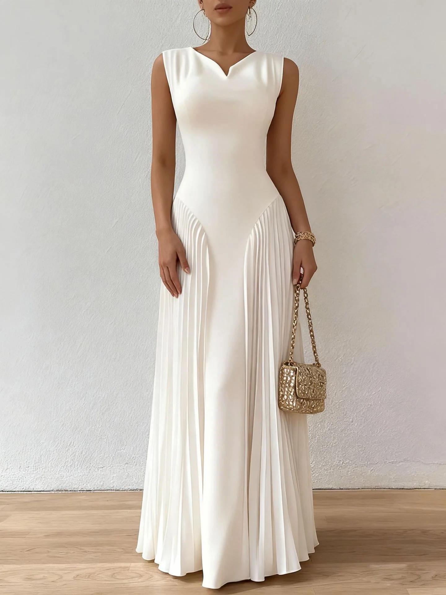 The Seraphina Sculptural Pleated Maxi Gown in Alabaster White